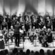 Der Kammerchor der TU Dortmund Der Kammerchor der TU Dortmund bei einem Konzert im Konzerthaus Dortmund.